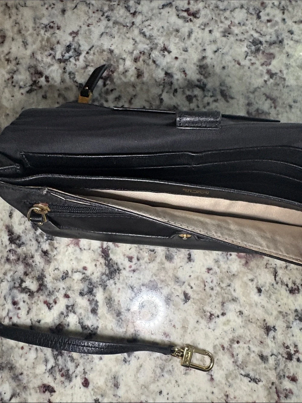 Tumi Black Leather Wristlet Clutch with Gold Hardware